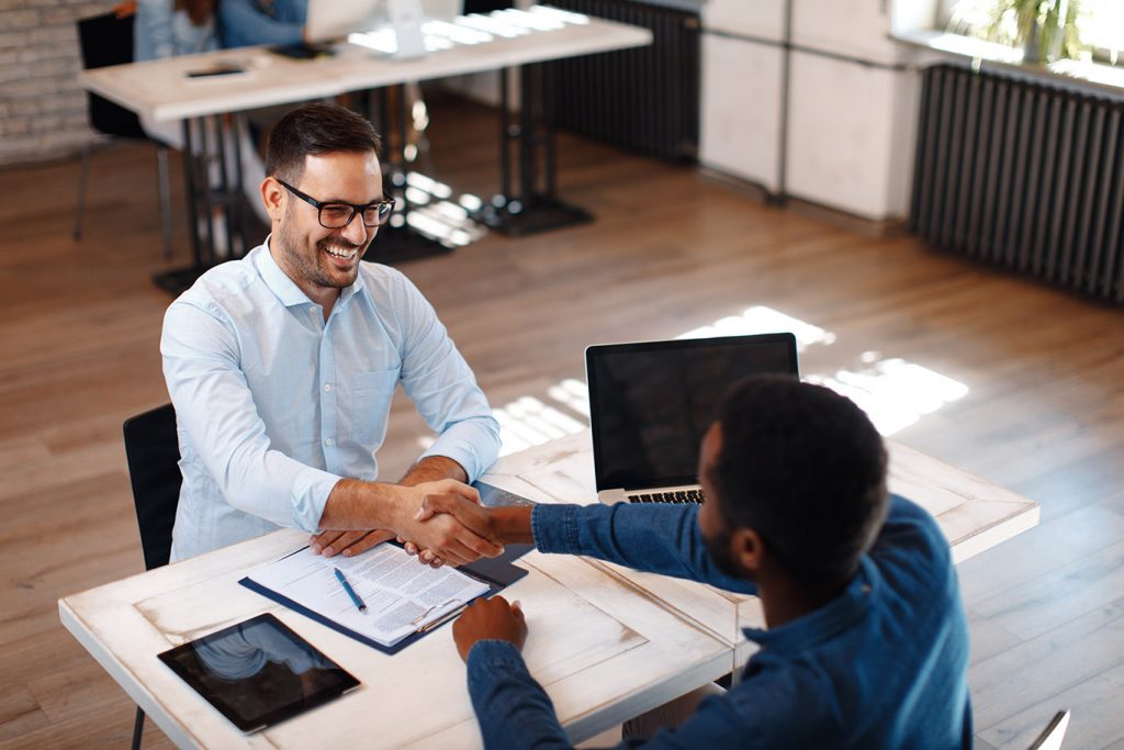 businessman getting a great deal, shaking hands